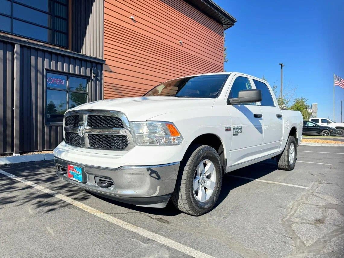 2022 RAM 1500 Classic SLT in Bright White Clearcoat — front three-quarter view