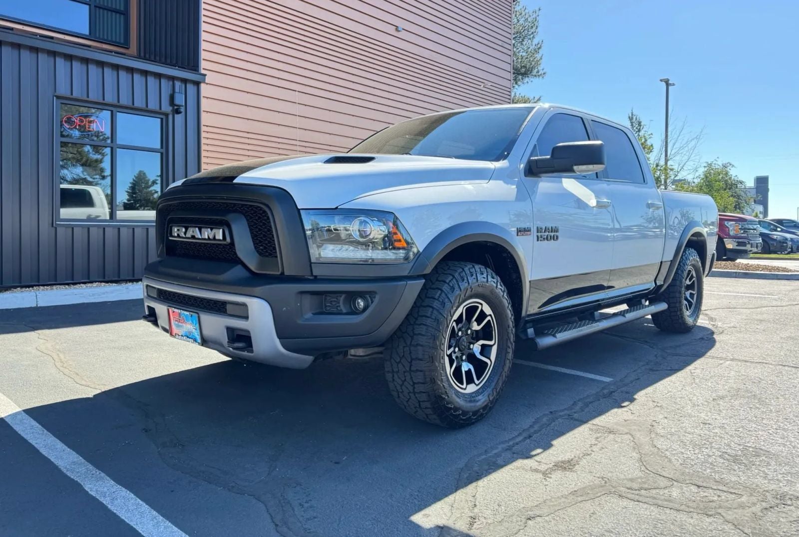 2018 RAM 1500 Rebel in Bright White Clearcoat — front three-quarter view