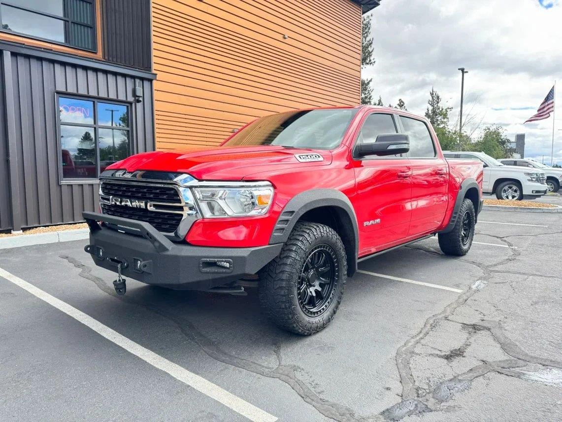 2022 RAM 1500 Big Horn/Lone Star in Flame Red Clearcoat — front three-quarter view