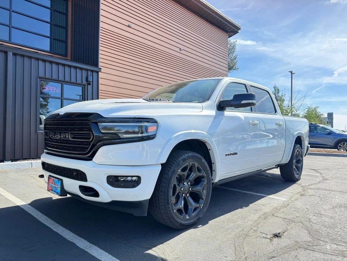 2022 RAM 1500 Limited in Ivory White Tri-Coat Pearlcoat — front three-quarter view