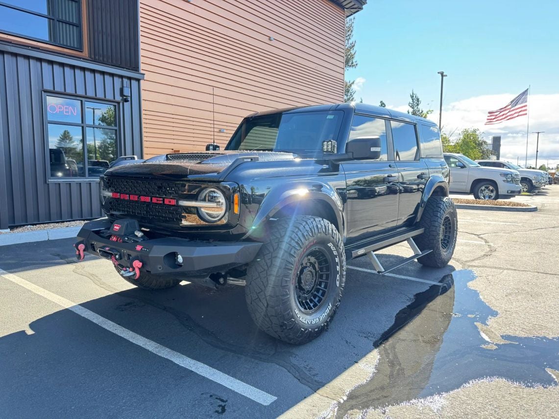 2022 Ford Bronco Wildtrak in Shadow Black — front three-quarter view
