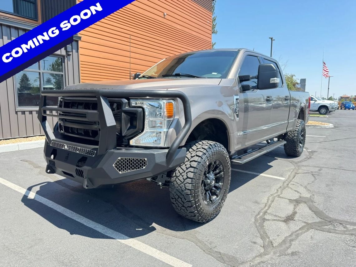 2022 Ford F-250SD XLT in Stone Gray Metallic — front three-quarter view