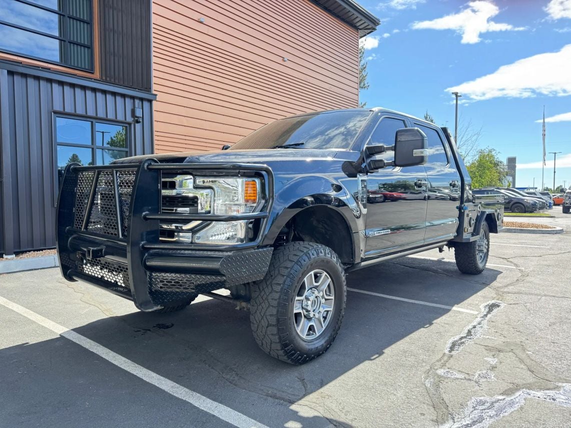 2020 Ford F-250SD Lariat in Black Metallic — front three-quarter view