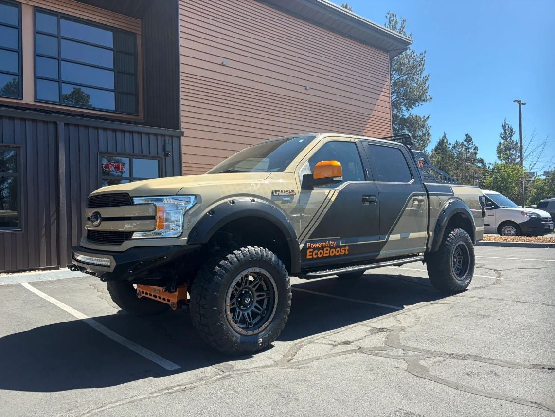 2018 Ford F-150 Lariat in Shadow Black — front three-quarter view