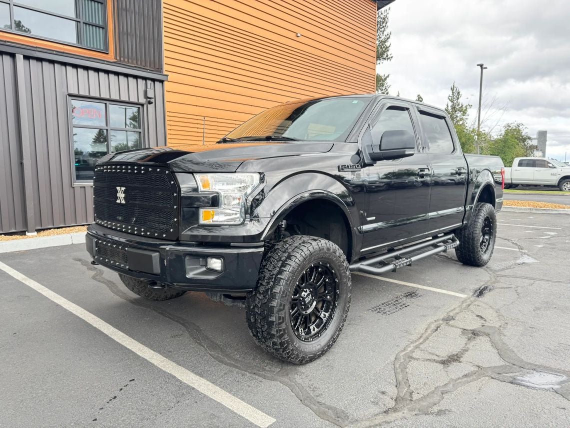 2016 Ford F-150 XLT in Shadow Black — front three-quarter view