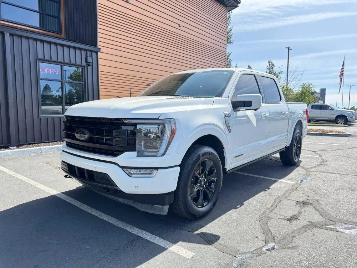 2023 Ford F-150 Platinum in White Metallic — front three-quarter view