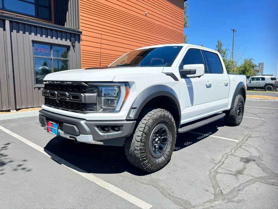 2023 Ford F-150 Raptor in Oxford White — front three-quarter view