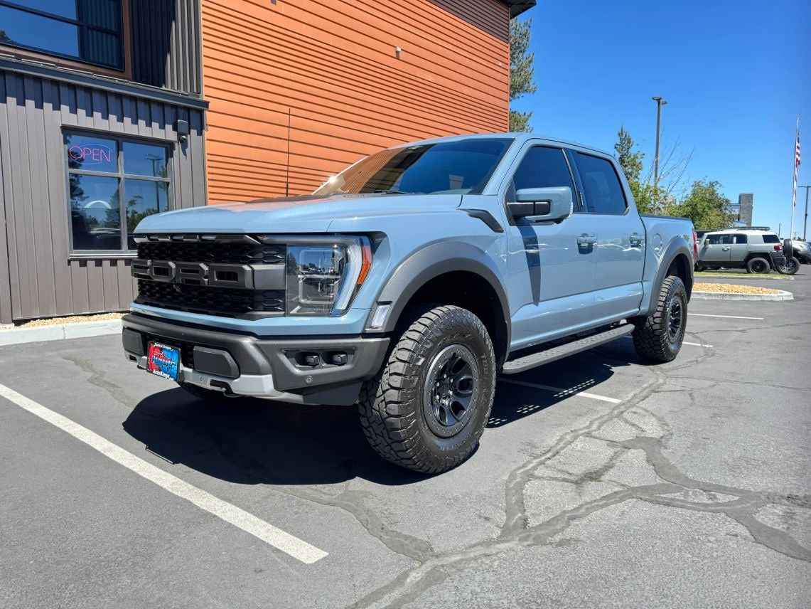 2023 Ford F-150 Raptor in Azure Gray Metallic — front three-quarter view