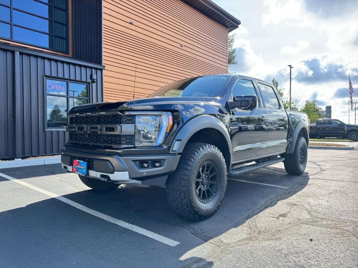 2021 Ford F-150 Raptor in Black Metallic — front three-quarter view