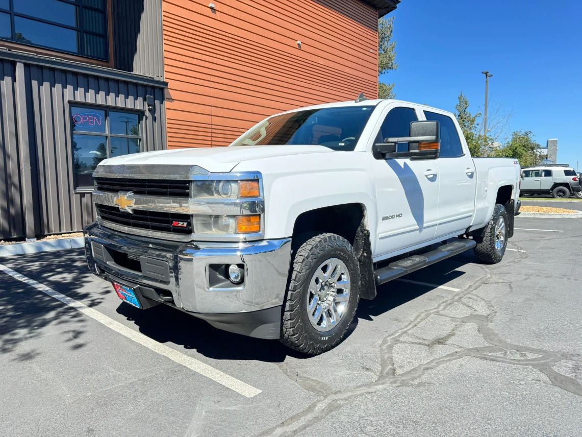 2017 Chevrolet Silverado 2500HD LT in White — front three-quarter view