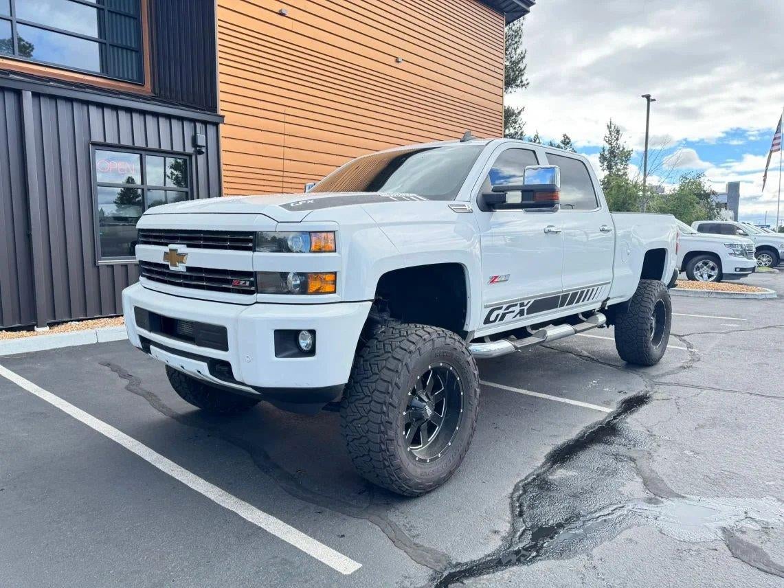 2016 Chevrolet Silverado 2500HD LTZ in White — front three-quarter view