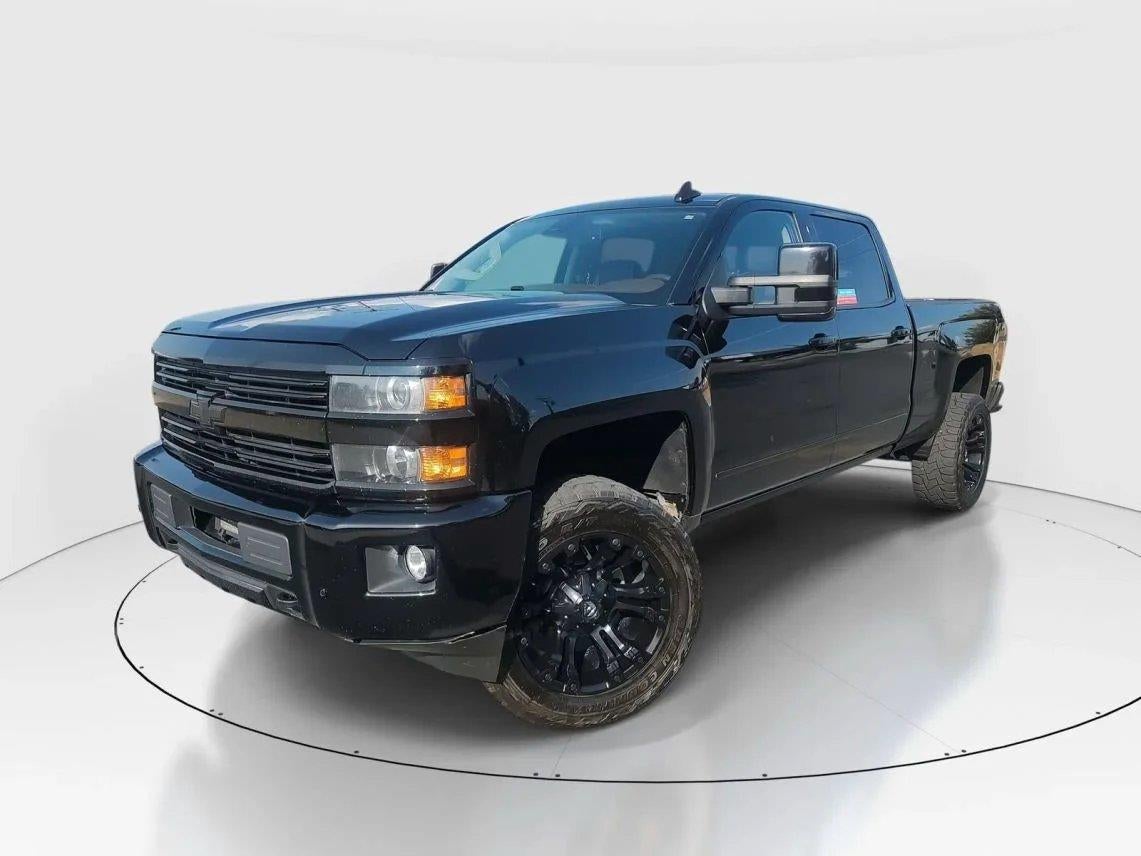 2015 Chevrolet Silverado 2500HD High Country in Black — front three-quarter view