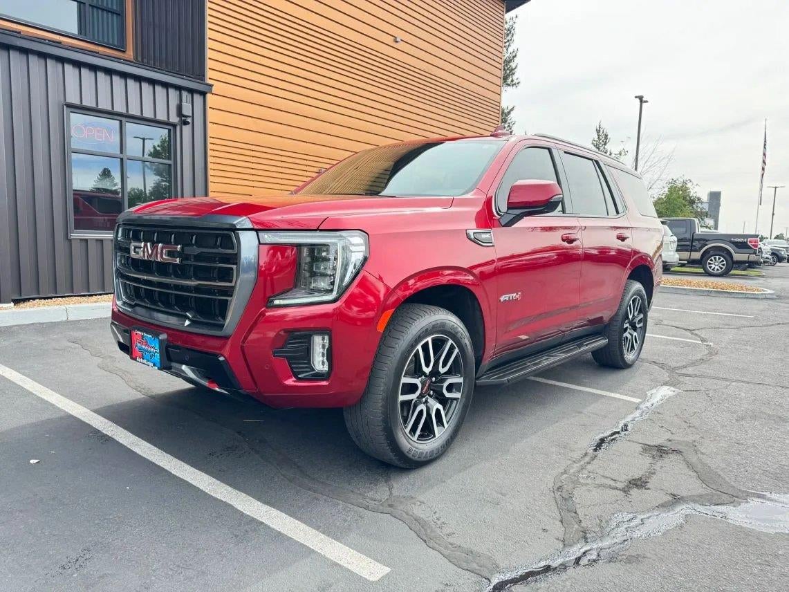 2022 GMC Yukon AT4 in Cayenne Red Tintcoat — front three-quarter view