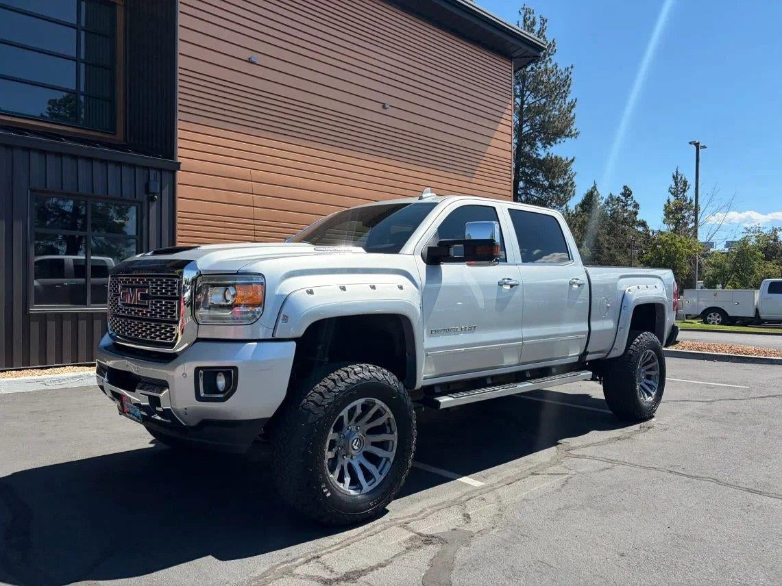 2019 GMC Sierra 2500HD Denali in Quicksilver Metallic — front three-quarter view