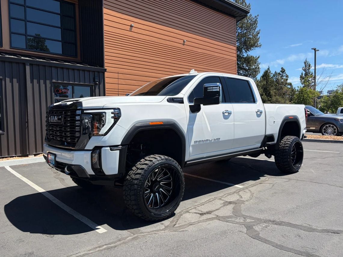 2024 GMC Sierra 2500HD Denali Ultimate in White Frost Tricoat — front three-quarter view