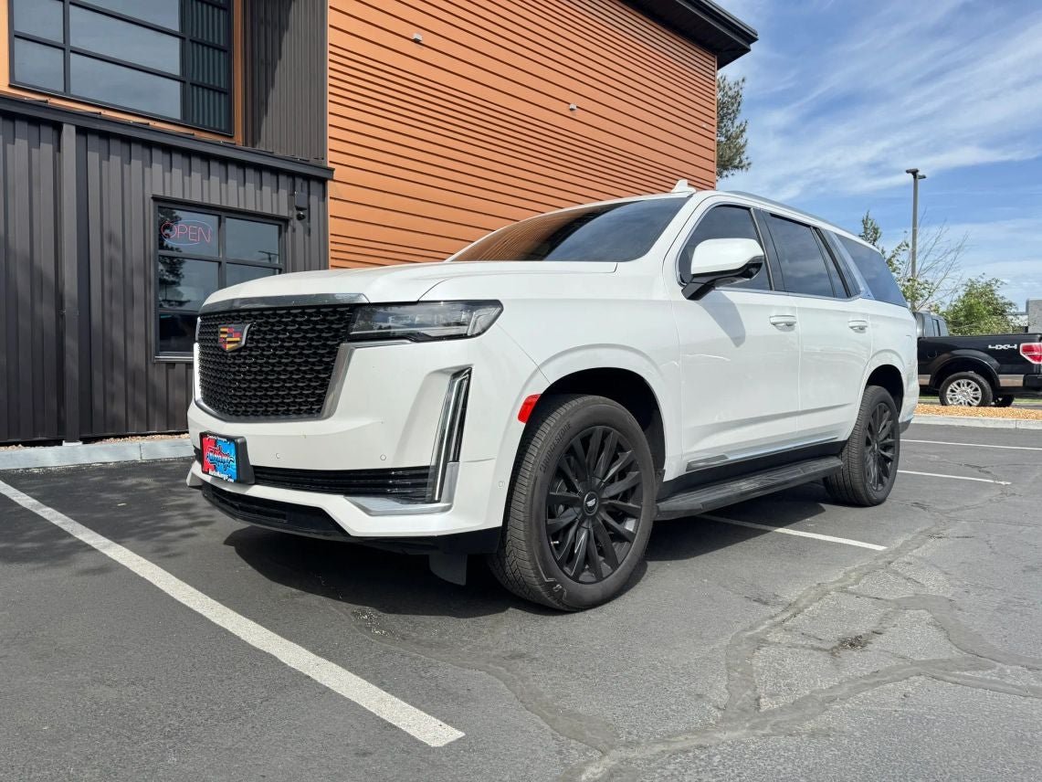 2021 Cadillac Escalade Premium Luxury in Crystal White Tricoat — front three-quarter view