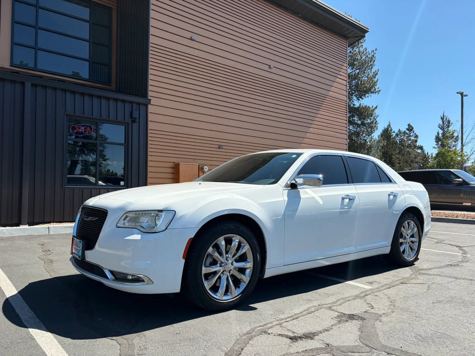 2015 Chrysler 300 C in Bright White Clearcoat — front three-quarter view