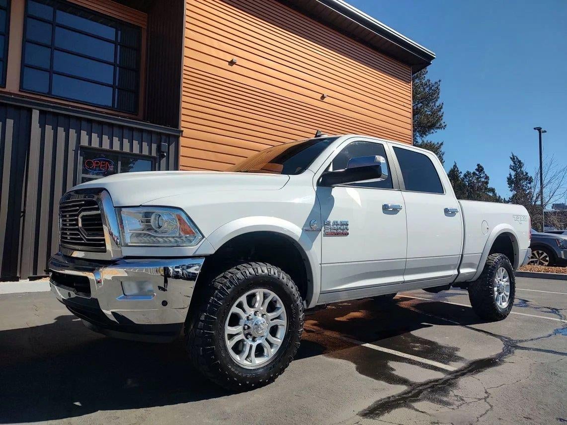 2016 RAM 2500 Laramie in Bright White Clearcoat — front three-quarter view