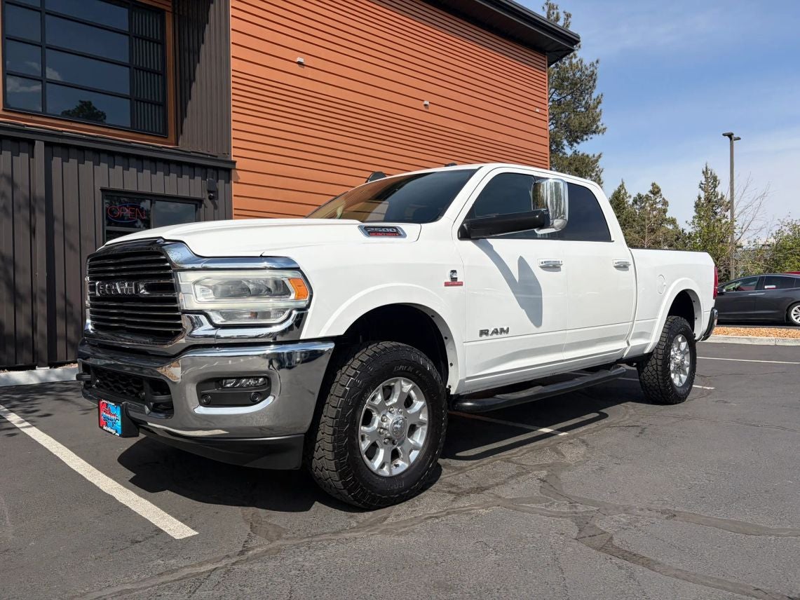 2021 RAM 2500 Laramie in Bright White Clearcoat — front three-quarter view