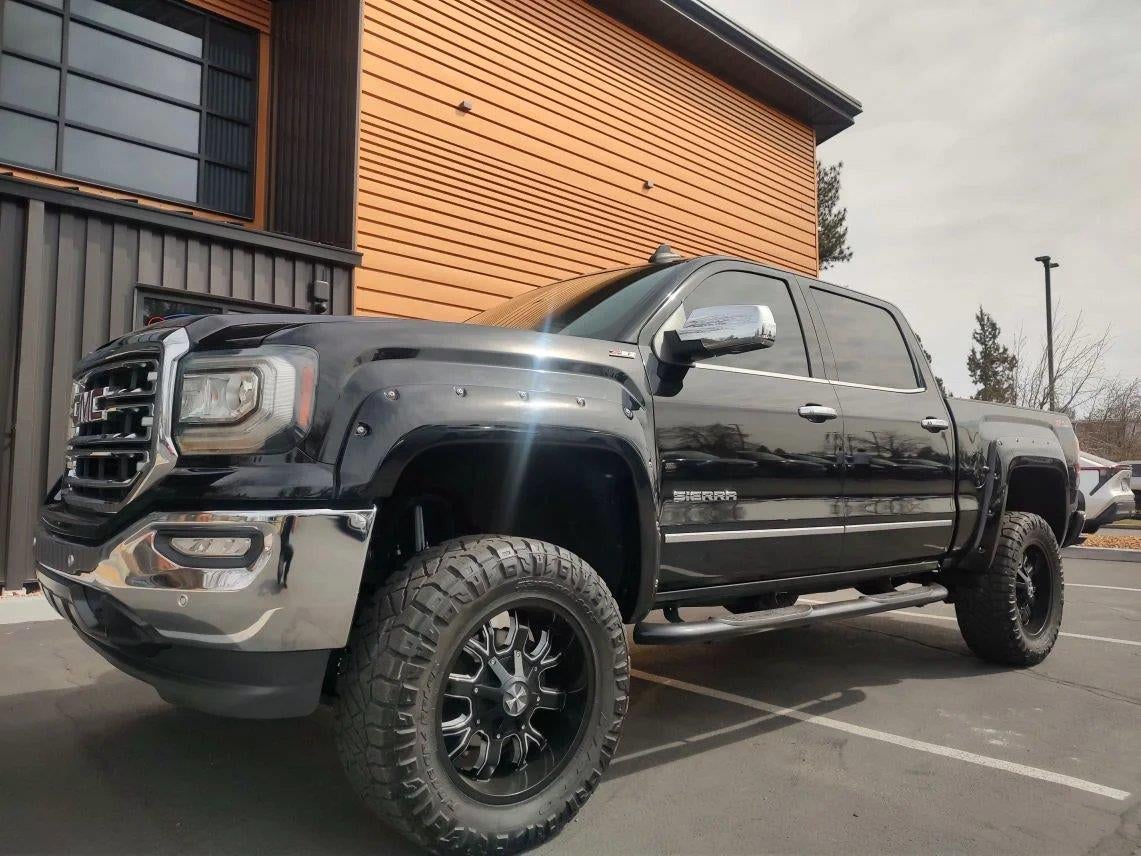 2017 GMC Sierra 1500 SLT in Onyx Black — front three-quarter view