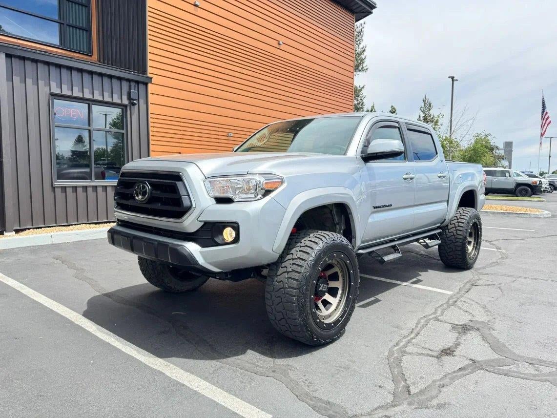 2023 Toyota Tacoma SR5 V6 in Celestial Silver Metallic — front three-quarter view