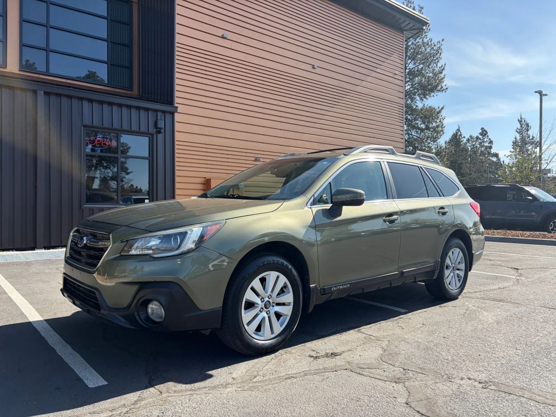 2019 Subaru Outback 2.5i Premium in Wilderness Green Metallic — front three-quarter view