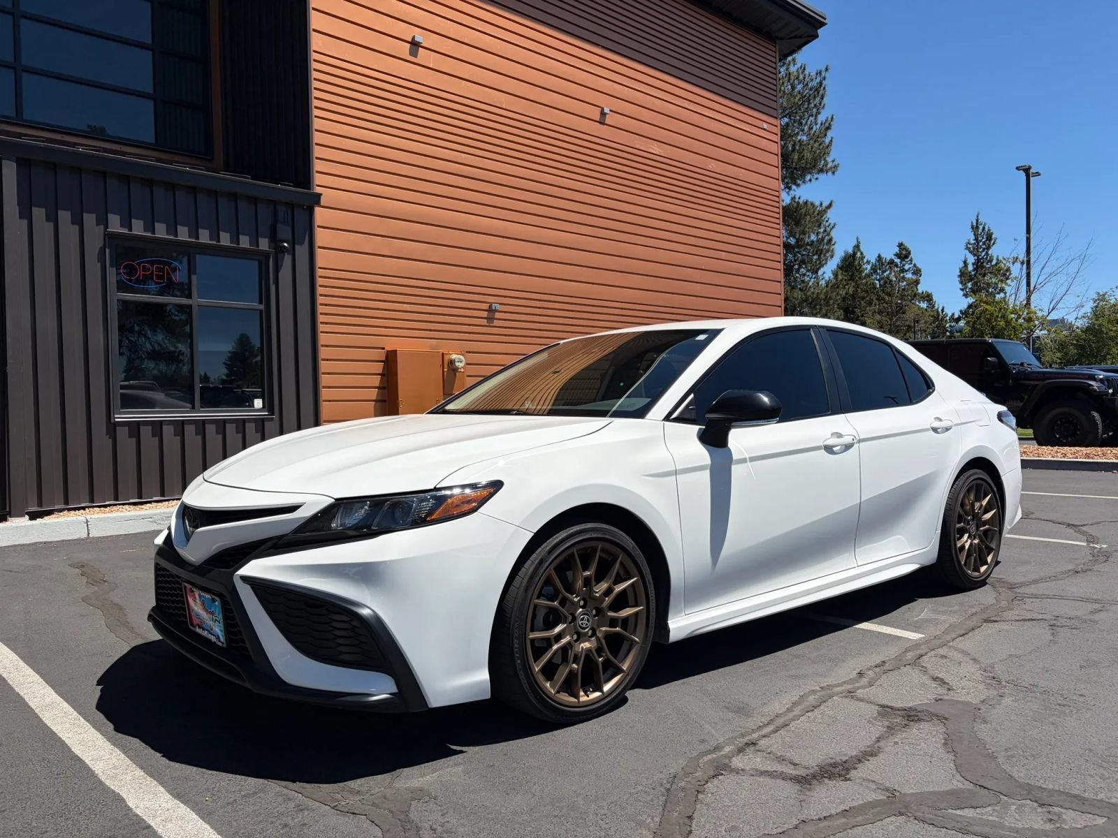 2023 Toyota Camry SE Nightshade in Ice — front three-quarter view