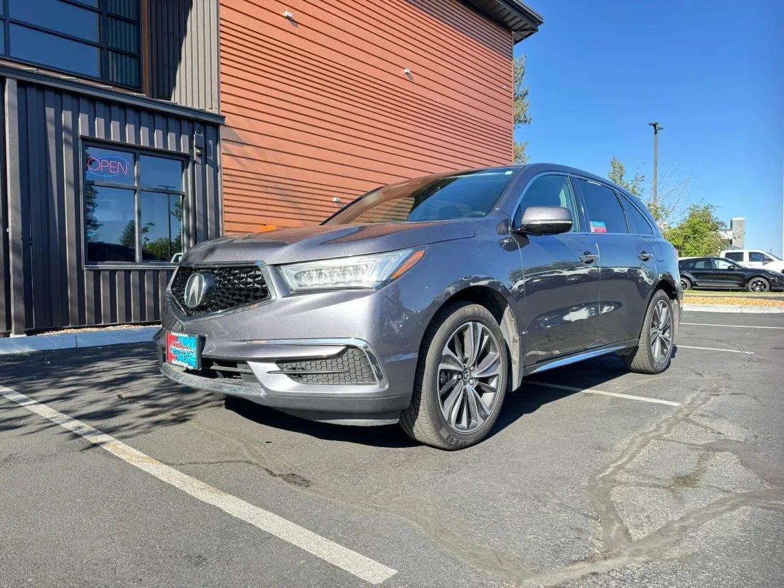 2020 Acura MDX Technology SH-AWD in Modern Steel — front three-quarter view