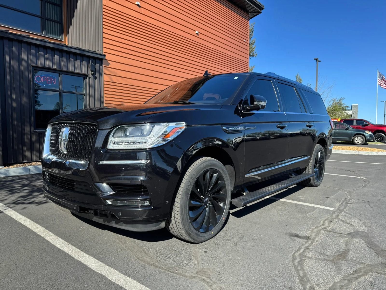 2021 Lincoln Navigator L Reserve in Black — front three-quarter view