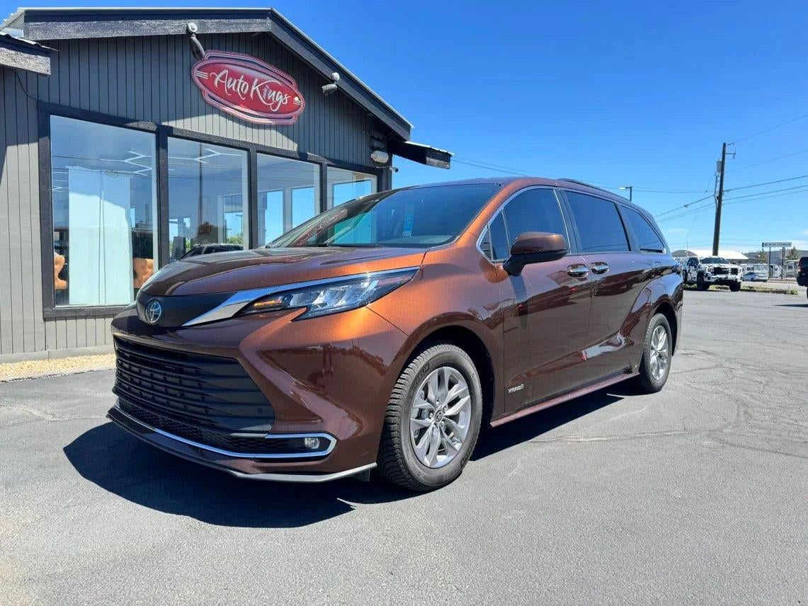 2021 Toyota Sienna XLE 8 Passenger in Sunset Bronze — front three-quarter view
