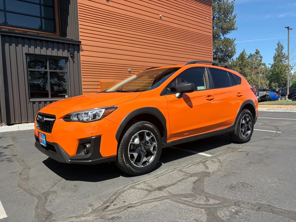 2019 Subaru Crosstrek 2.0i in Sunshine Orange — front three-quarter view
