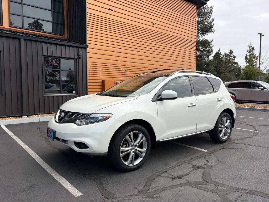 2011 Nissan Murano LE in Glacier Pearl Clearcoat — front three-quarter view