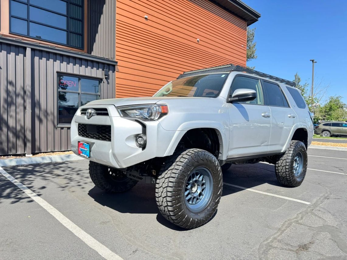 2021 Toyota 4Runner SR5 in Classic Silver Metallic — front three-quarter view