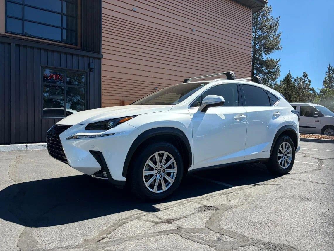 2020 Lexus NX 300h in White Pearl — front three-quarter view