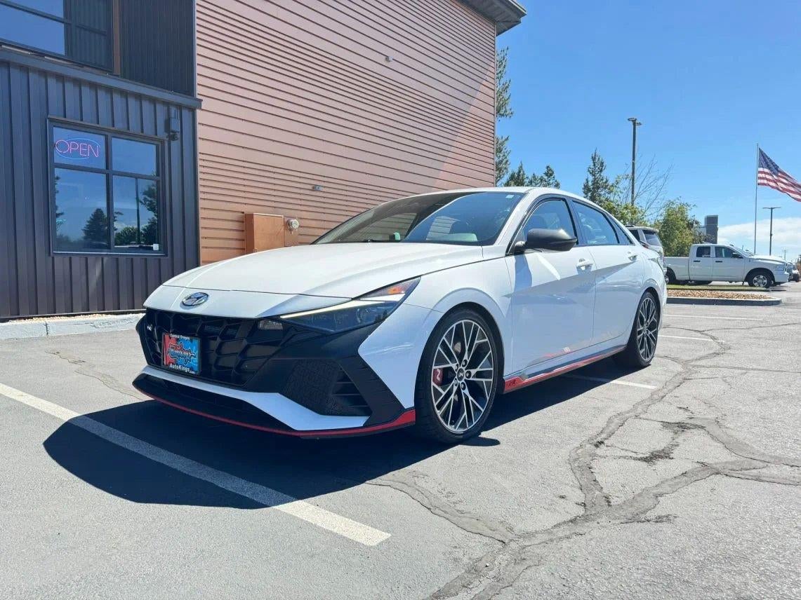 2022 Hyundai Elantra N Base in Ceramic White — front three-quarter view