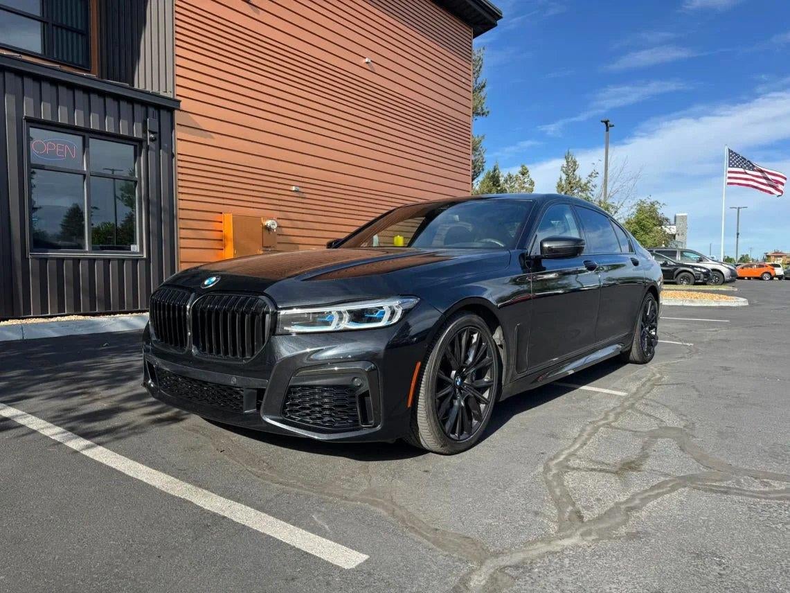 2020 BMW 7 Series 750i xDrive in Black Sapphire Metallic — front three-quarter view