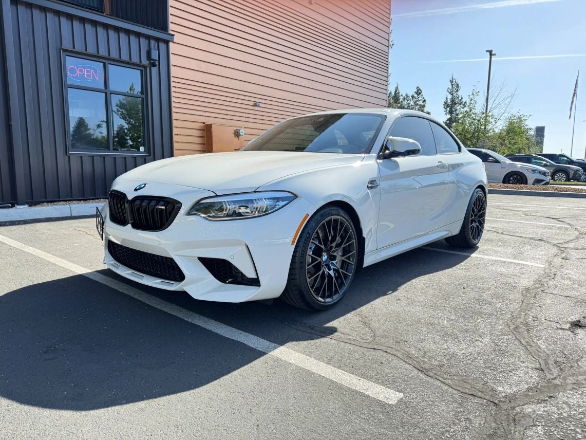 2021 BMW M2 Competition in Alpine White — front three-quarter view